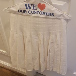 White pleaded skirt